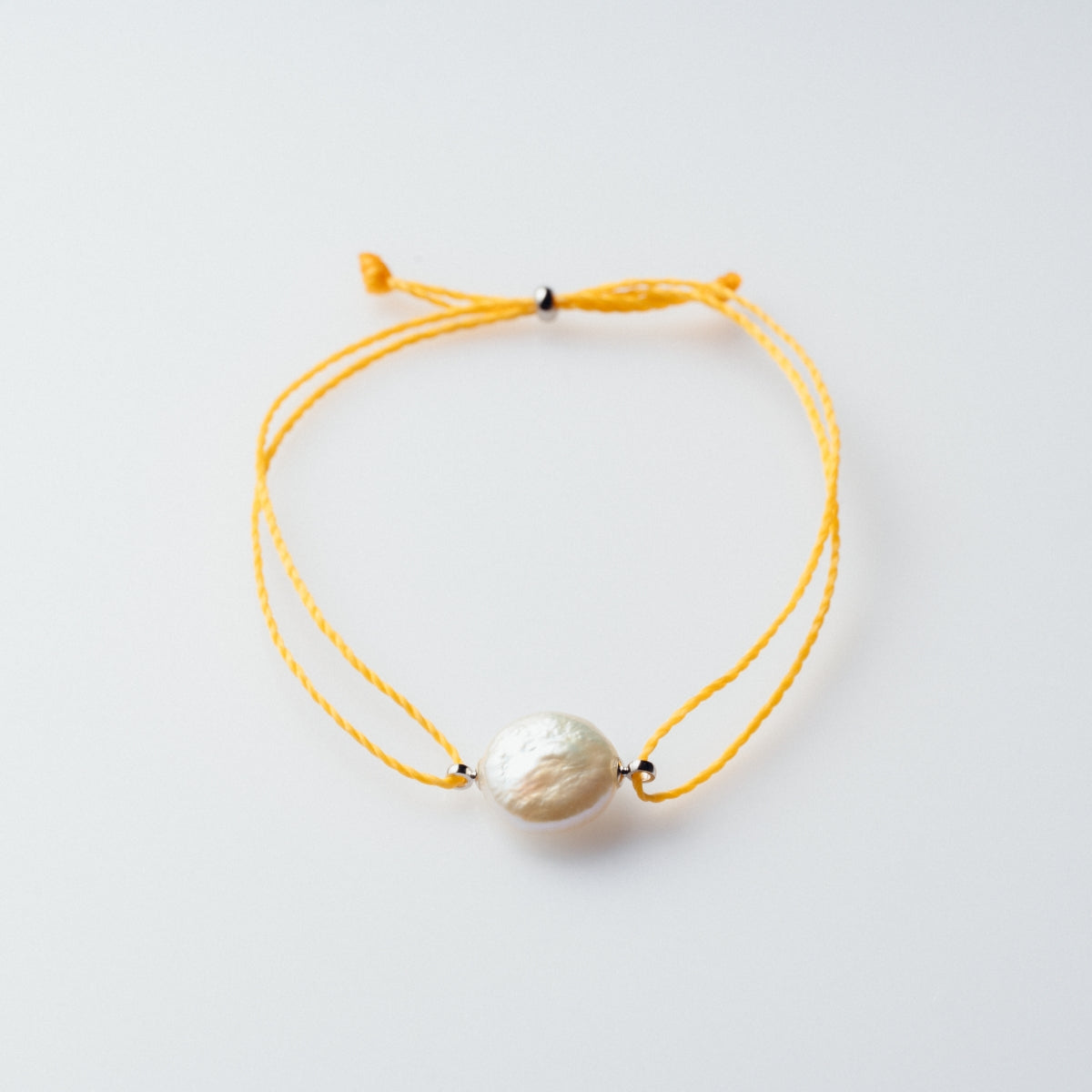 10color】フラット淡水パールコードブレスレット | LAT34°N